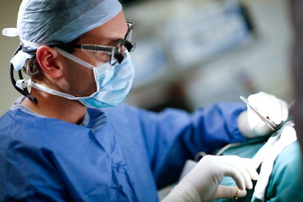Surgeon during penile thickening surgery